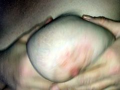 Playing with big saggy tit!