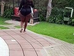 Kenyan big bum walking in a swim suit