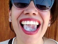 Pretty Girl Plays With A Mouthful Of Cum On The Street