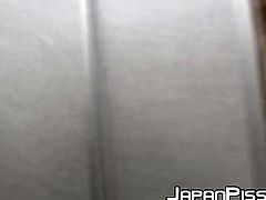 Japanese amateur drenches staircase after pissing