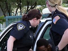 Female cop starts sucking on the parking