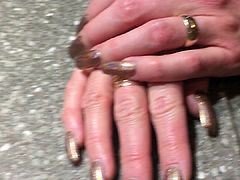 Long square tip beautiful nails in an iridescent color