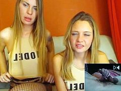 Two girls react to awesome cumshot with cockrings