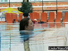 Russian teen Katy Soroka doing an underwatershow in a white dress