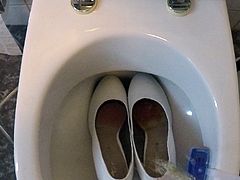 Piss in white high heels