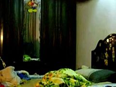 An amateur mature asian couple having hard sex right in front of the webcam to make some cash.