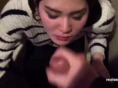 In the morning before she goes to work, completely dressed, my asian woman unzips my fly and goes for a cum breakfast. Cumshot straight in her hungry mouth.