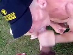 guy sucks his mates cock while pissing outside