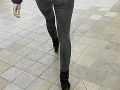 PERFECT ASS TEEN IN TIGHT SKINNY JEANS AND HIGH HEELS BOOTS