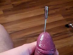 Big cock cumming with a 10 inch rosebud sound inside