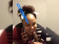Ebony on phone to babyfather whilst sucking dick