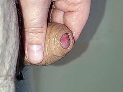 Slow stroking cum covered cock