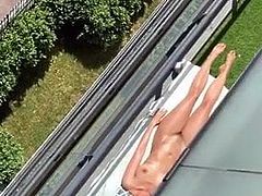 Voyeur spies on neighbour sunbathing nude