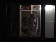 Hot teen slut strips and flashes naked in bedroom window