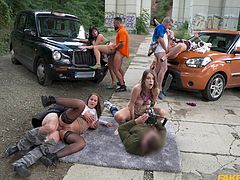 This hot taxi ride turns very quickly into a super hot outdoor orgy with some hot babes and hunks. Some doing doggy style, others cock riding cowgirl style, another getting a good pounding on the taxi bonnet. These girls swing both ways, they also kiss and caress each other while being fucked.