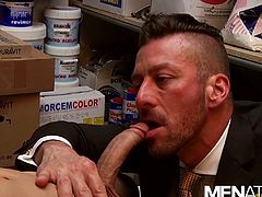 The horny boss promised his employer to give him a promotion in return for fucking his ass and took his employer to the store room where after kissing he pulled his hard erect dick out and gave a sloppy blowjob to his throbbing cock and made him cum, so he can smoothly fuck his ass afterwards.