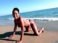 This petite ebony beauty was out at the beach today when she found a hot stud and in order to attract and seduce him, she got to flaunting her curves and surely enough, the stud rushed over to caress her titties and fingerfuck her coochie before eating her out nicely and getting her to stroke his boner.