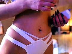 Blonde Glasses Babe with Huge Ass and Tits Teases in Mirror