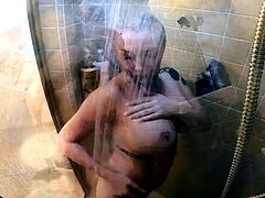 Big Boobed Blonde Masturbates With A Dildo In The Bathroom