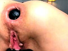Gaping anal fist fetish lesbo big toy foreplay in bedroom